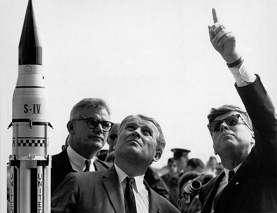 NASA Deputy Administrator Robert Seamans, Dr. Wernher von Braun, and President John F. Kennedy at Cape Canaveral (1963)
